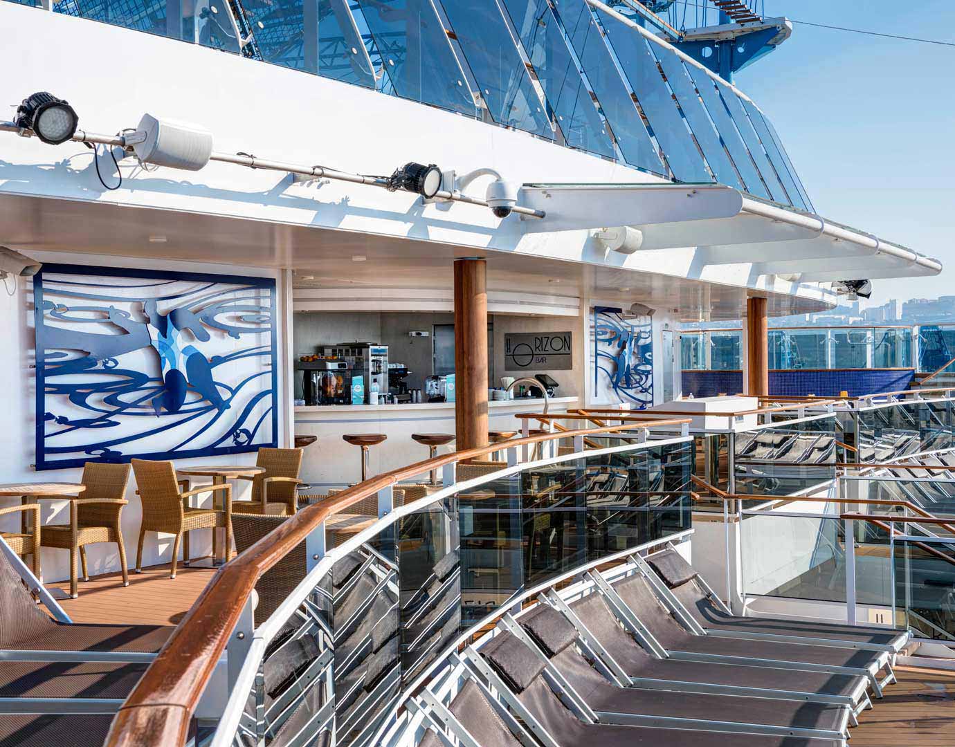 Outdoor Horizon Bar with modern decor and sun loungers on an MSC Cruises ship | MSC Cruises Outdoor Horizon Bar with modern decor and sun loungers on an MSC Cruises ship | MSC Cruises