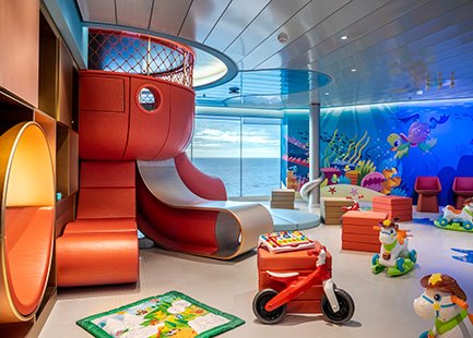 Colorful kids' play area onboard with slides, toys, and ocean views | MSC Cruises